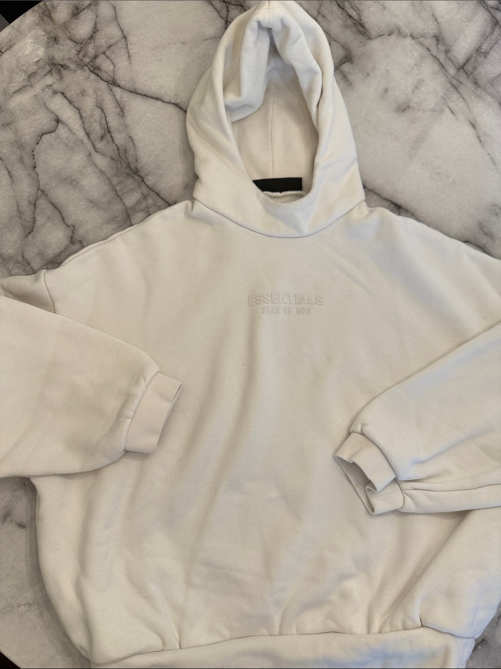 Fear of God Essentials Hooded Sweatshirt in Off-White